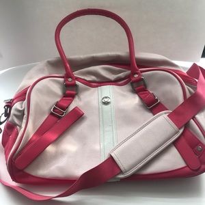 Just reduced!! Lululemon pink leather bag w/strap